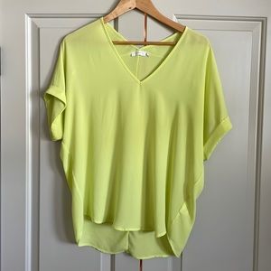 Lush, V neck, roll sleeve satin like blouse. Great condition.